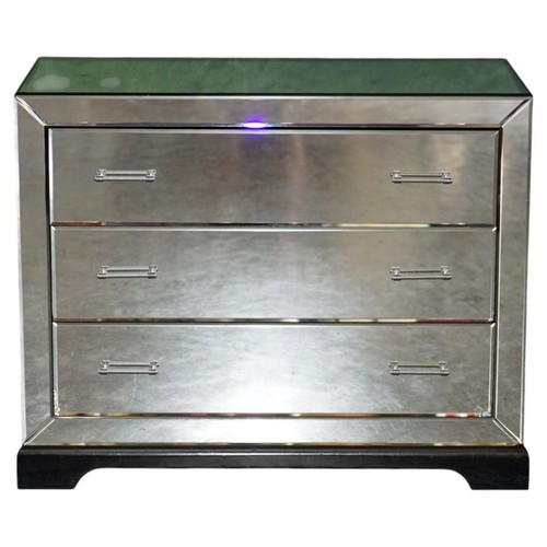 Mirrored chest drawers in - of,